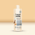 Cargar la imagen en la vista de la galería, Lumi-noble Fragrance Free Sensitive Pet Shampoo 16 fl oz bottle on cream background

